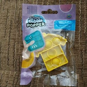 #676 NWT Sensory bubble mini popper. Yellow t-shirt